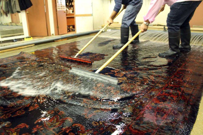 Hand washing an oriental rug